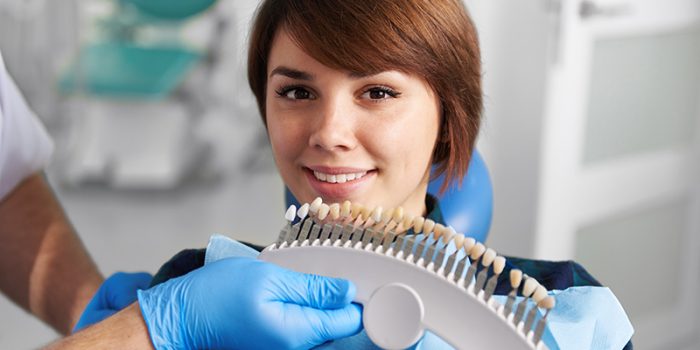 woman having her teeth whitened at the dentist